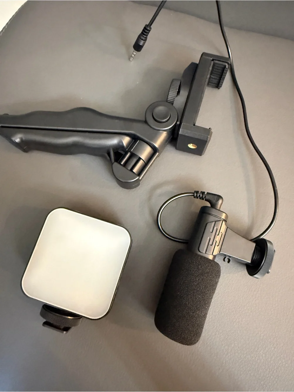 Portable Black Lavalier Microphone Kit with LED Fill Light and Mini Tripod